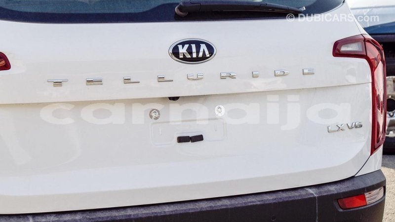 Big with watermark kia carens abia state import dubai 9802