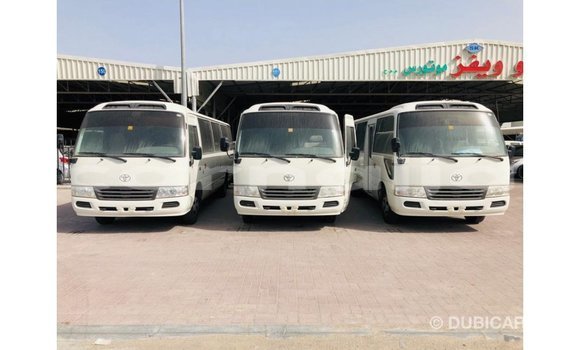Acheter Import Voiture Toyota Coaster Blanc à Import - Dubai, État d'Abia Acheter Import Voiture Toyota Coaster Blanc à Import - Dubai, État d'Abia