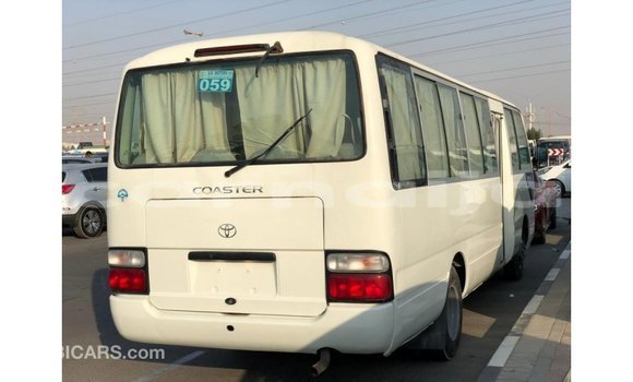 Acheter Import Voiture Toyota Coaster Blanc à Import - Dubai, État d'Abia Acheter Import Voiture Toyota Coaster Blanc à Import - Dubai, État d'Abia