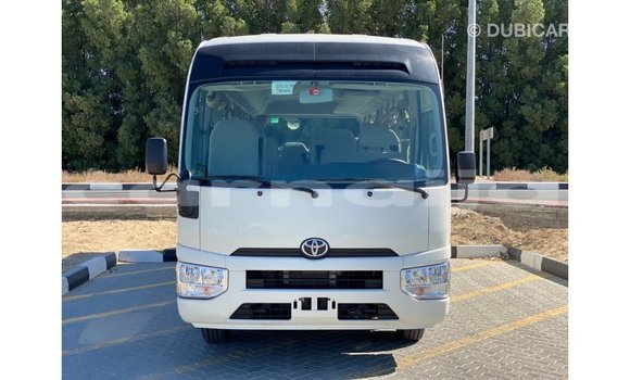 Acheter Import Voiture Toyota Coaster Blanc à Import - Dubai, État d'Abia Acheter Import Voiture Toyota Coaster Blanc à Import - Dubai, État d'Abia