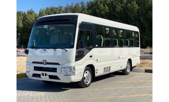 Acheter Import Voiture Toyota Coaster Blanc à Import - Dubai, État d'Abia Acheter Import Voiture Toyota Coaster Blanc à Import - Dubai, État d'Abia