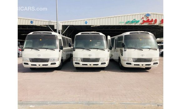 Acheter Import Voiture Toyota Coaster Blanc à Import - Dubai, État d'Abia Acheter Import Voiture Toyota Coaster Blanc à Import - Dubai, État d'Abia