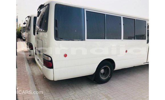 Acheter Import Voiture Toyota Coaster Blanc à Import - Dubai, État d'Abia Acheter Import Voiture Toyota Coaster Blanc à Import - Dubai, État d'Abia