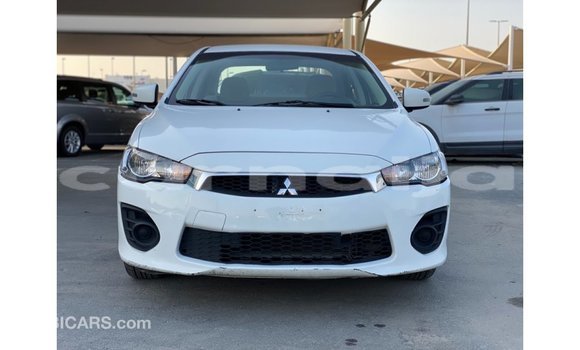 Acheter Import Voiture Mitsubishi Lancer Blanc à Import - Dubai, État d'Abia Acheter Import Voiture Mitsubishi Lancer Blanc à Import - Dubai, État d'Abia