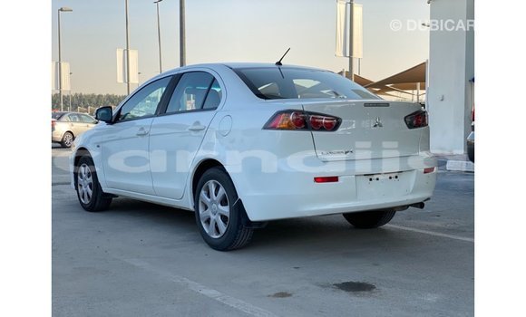 Acheter Import Voiture Mitsubishi Lancer Blanc à Import - Dubai, État d'Abia Acheter Import Voiture Mitsubishi Lancer Blanc à Import - Dubai, État d'Abia
