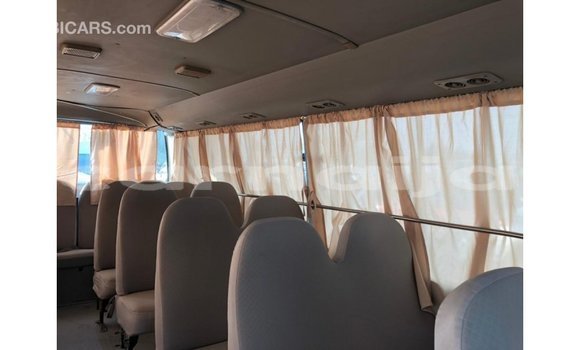 Acheter Import Voiture Toyota Coaster Blanc à Import - Dubai, État d'Abia Acheter Import Voiture Toyota Coaster Blanc à Import - Dubai, État d'Abia