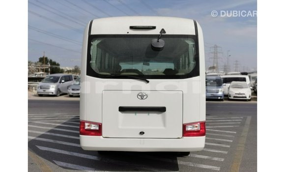 Acheter Import Voiture Toyota Coaster Blanc à Import - Dubai, État d'Abia Acheter Import Voiture Toyota Coaster Blanc à Import - Dubai, État d'Abia