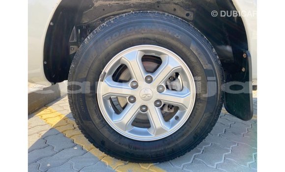 Buy Import Mitsubishi L200 White Car in Import - Dubai in Abia State Buy Import Mitsubishi L200 White Car in Import - Dubai in Abia State