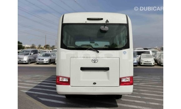 Acheter Import Voiture Toyota Coaster Blanc à Import - Dubai, État d'Abia Acheter Import Voiture Toyota Coaster Blanc à Import - Dubai, État d'Abia