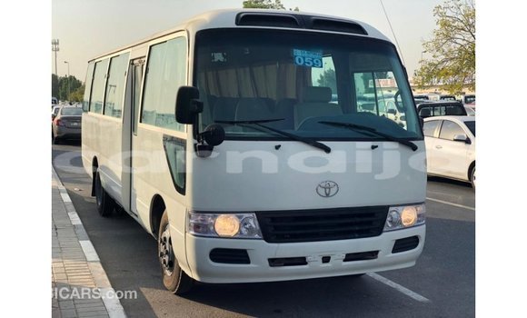 Acheter Import Voiture Toyota Coaster Blanc à Import - Dubai, État d'Abia Acheter Import Voiture Toyota Coaster Blanc à Import - Dubai, État d'Abia