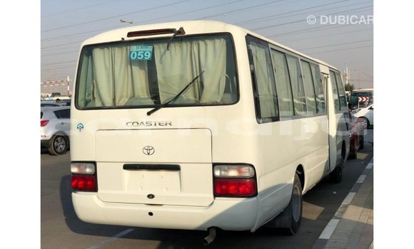 Acheter Import Voiture Toyota Coaster Blanc à Import - Dubai, État d'Abia Acheter Import Voiture Toyota Coaster Blanc à Import - Dubai, État d'Abia
