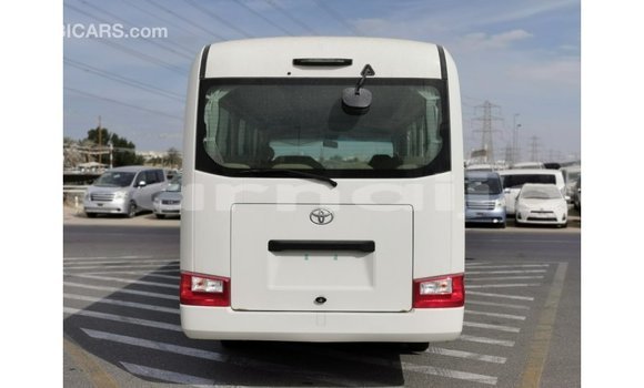 Acheter Import Voiture Toyota Coaster Blanc à Import - Dubai, État d'Abia Acheter Import Voiture Toyota Coaster Blanc à Import - Dubai, État d'Abia