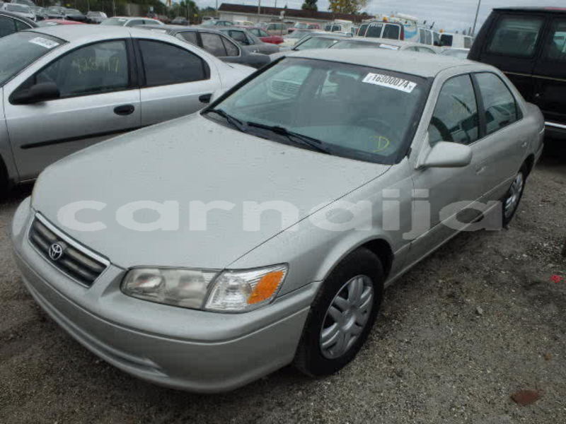 Big with watermark 2004 toyota camry tiny light front side view