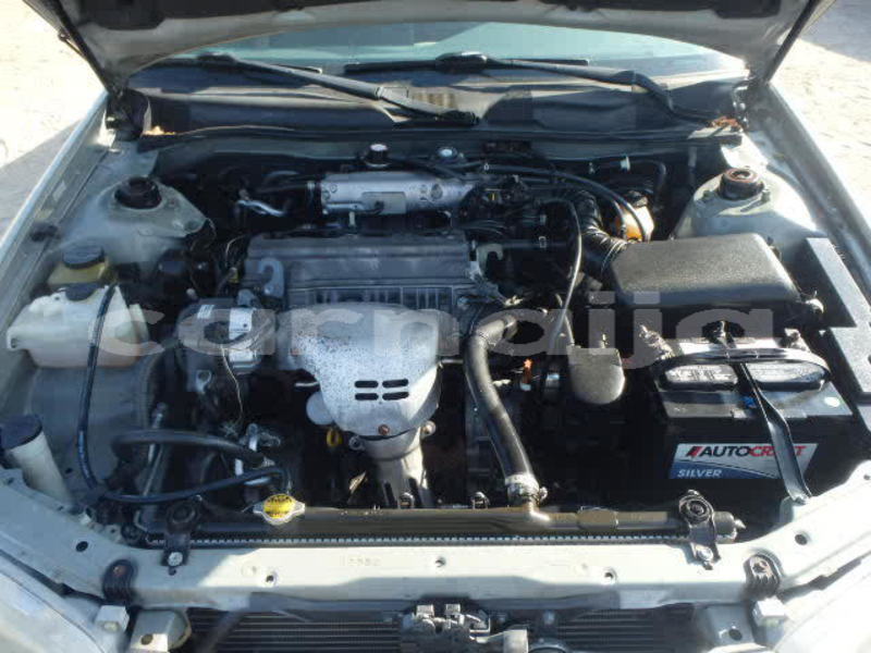 Big with watermark 2004 toyota camry tiny light egine view