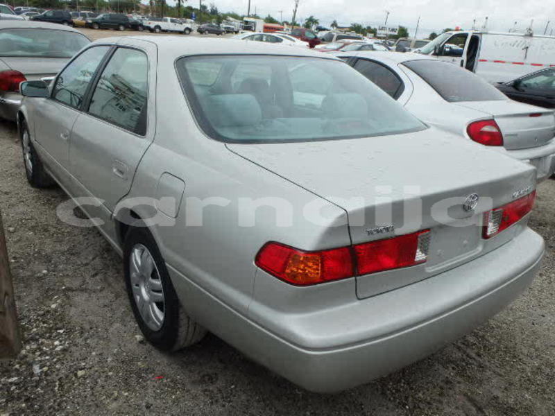 Big with watermark 2004 toyota camry tiny light back side view