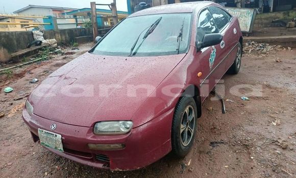 Buy Used Mazda 323 Red Car in Shagamu in Ogun State Buy Used Mazda 323 Red Car in Shagamu in Ogun State