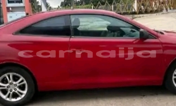 Buy Used Toyota Corolla Red Car in Abuja in Lagos State