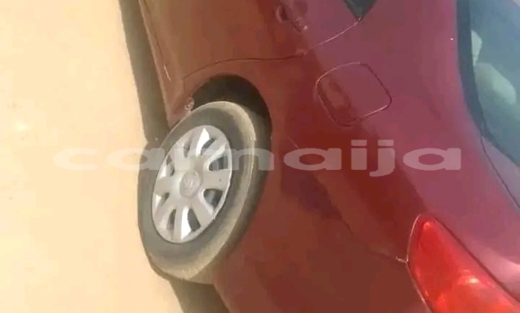 Buy Used Toyota Corolla Red Car in Abuja in Lagos State