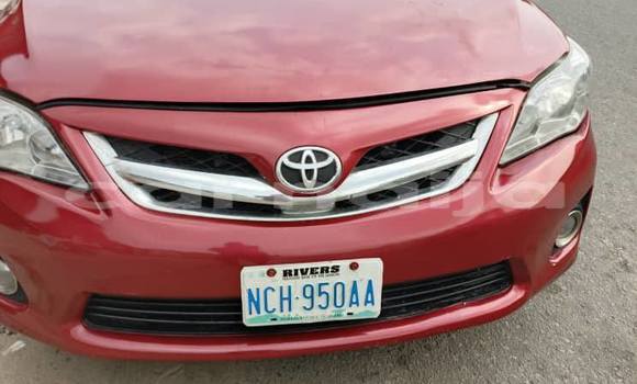 Buy Used Toyota Corolla Red Car in Abuja in Lagos State