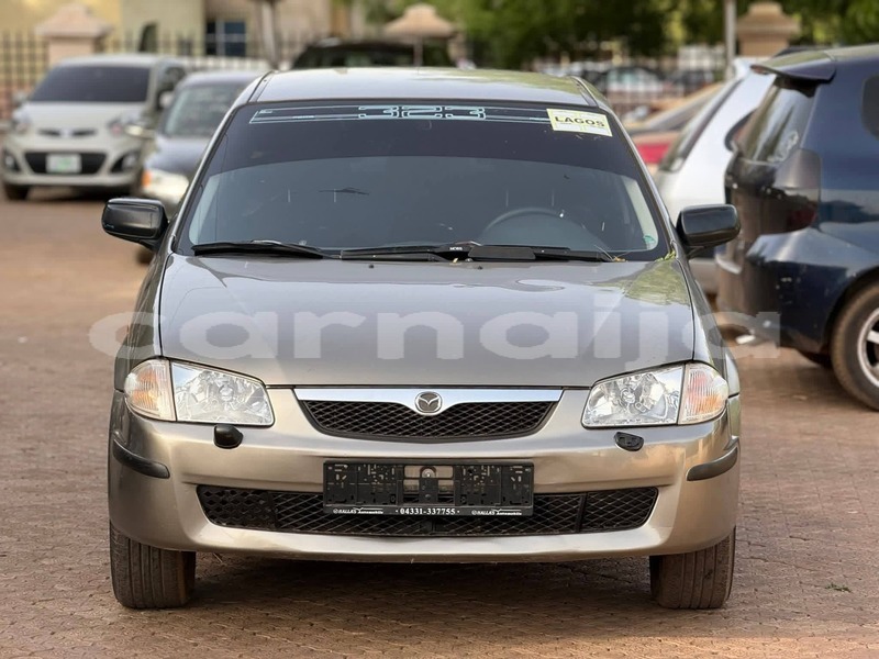 Big with watermark mazda 323 abia state aba 47749