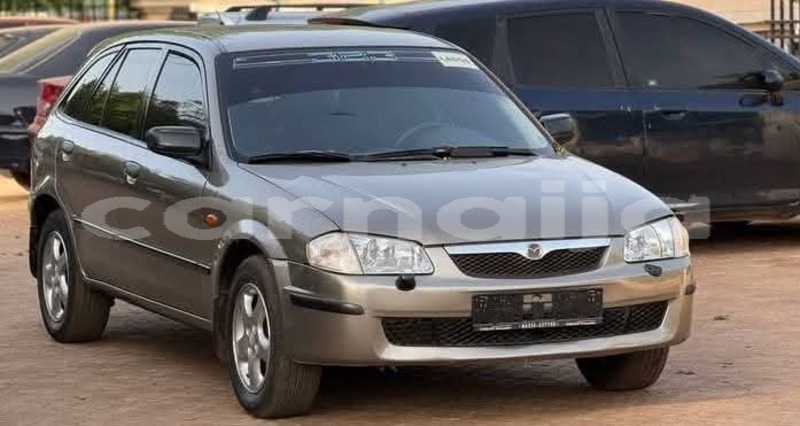 Big with watermark mazda 323 abia state aba 47749