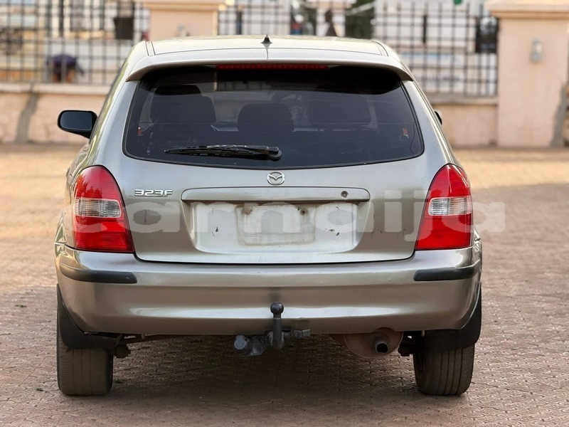 Big with watermark mazda 323 abia state aba 47749