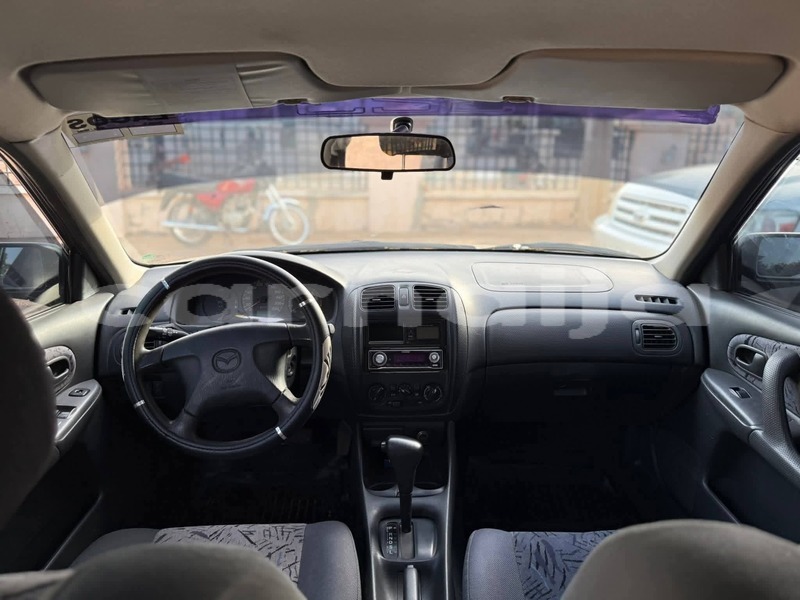 Big with watermark mazda 323 abia state aba 47749