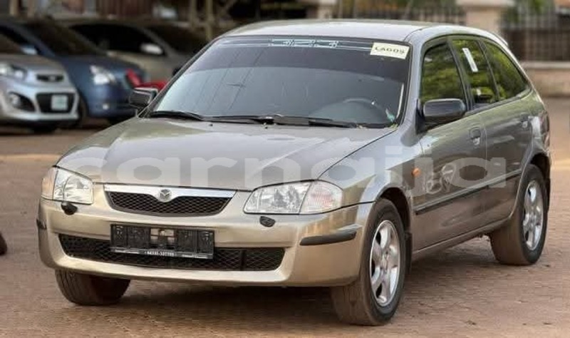 Big with watermark mazda 323 abia state aba 47749