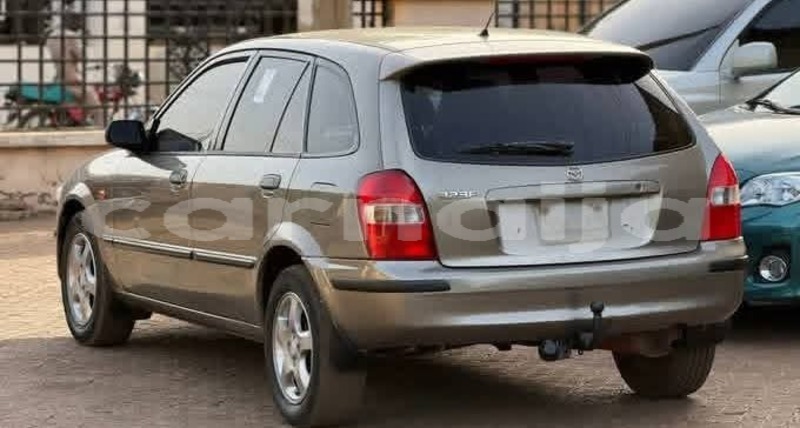 Big with watermark mazda 323 abia state aba 47749