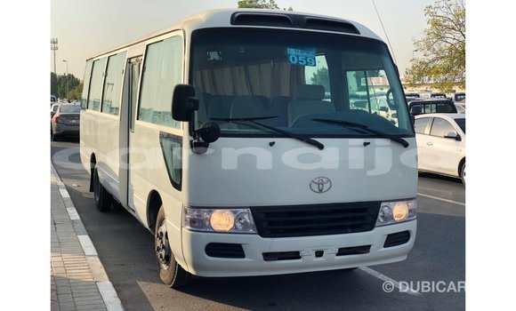Acheter Import Voiture Toyota Coaster Blanc à Import - Dubai, État d'Abia Acheter Import Voiture Toyota Coaster Blanc à Import - Dubai, État d'Abia