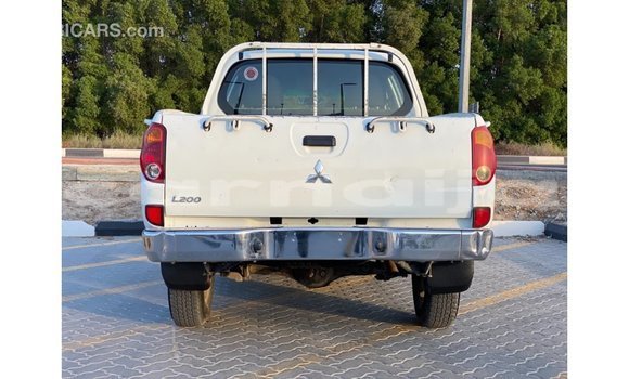 Buy Import Mitsubishi L200 White Car in Import - Dubai in Abia State Buy Import Mitsubishi L200 White Car in Import - Dubai in Abia State