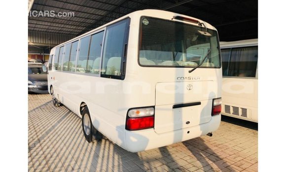 Acheter Import Voiture Toyota Coaster Blanc à Import - Dubai, État d'Abia Acheter Import Voiture Toyota Coaster Blanc à Import - Dubai, État d'Abia